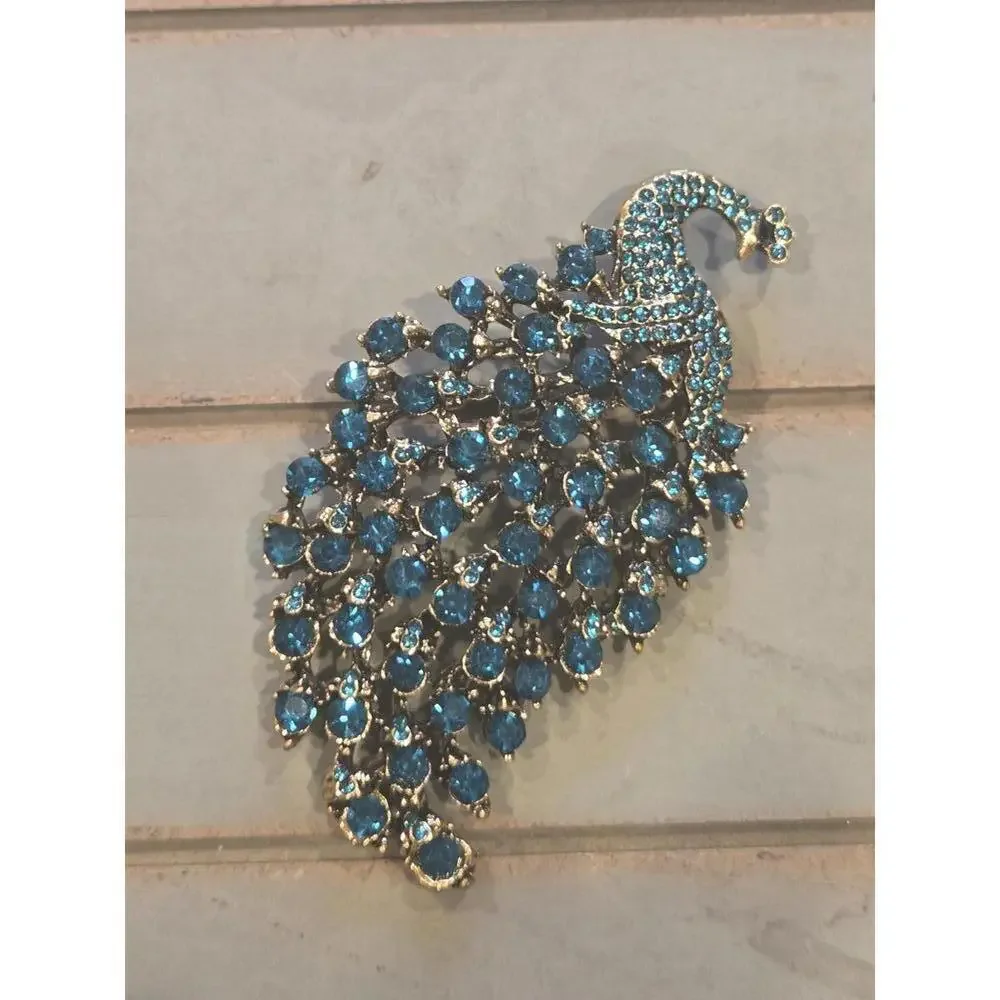 Blue green rhinestone jeweled peacock brooch